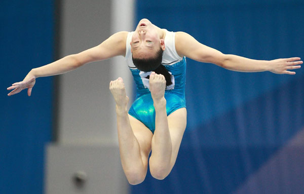 Zhangye Linzi, the only Chinese female gymnast in the Universiade, competes during the balance beam event at the Kazan Universiade in Kazan, Russia, July 10, 2013. Chinese divers back to winning track at Universiade