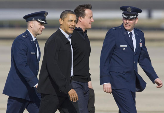 Obama has British PM aboard Air Force One Obama has British PM aboard Air Force One