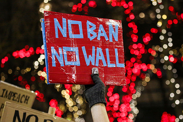 16 US state attorneys general call Trump's refugee ban